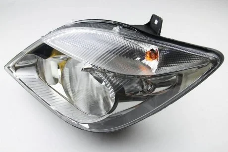 Фара основная галоген с лампами,с мотором H7/H7 PY21W W5W лів.Sprinter 06- HELLA 1EB247012011