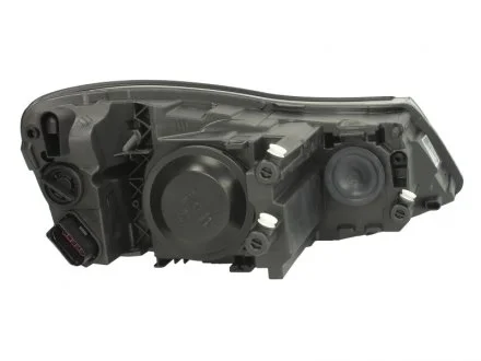 Фара основная галоген с мотором,без ламп,H7/H1 PY21W W5W лів.Octavia II 09- HELLA 1EL247052251